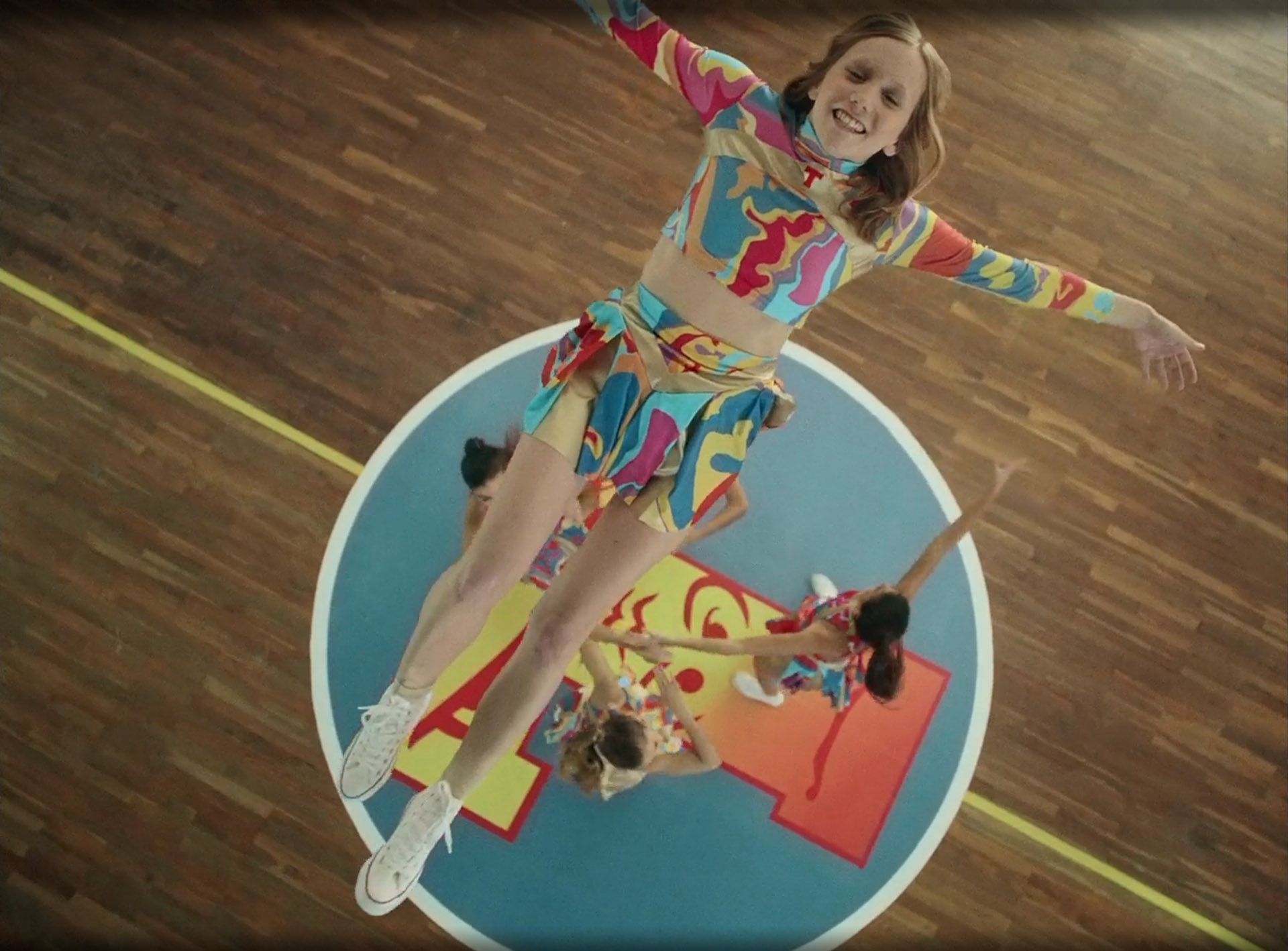 Cheerleader and logo